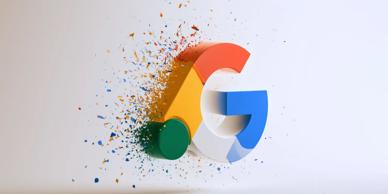 Three-dimensional render of the Google letter G on a white background, its left edge disintegrating into hundreds of shards in the four brand colours, red, yellow, green and blue