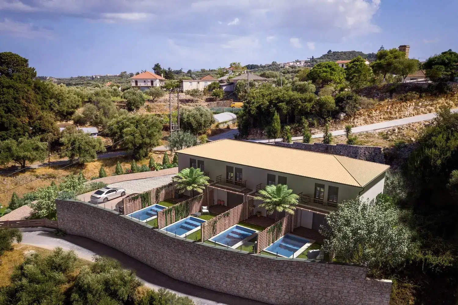 Vedere aeriană a terenului Ela Home din Kypseli, Zakynthos, cu cele patru piscine private